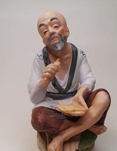 Vintage HOMCO made in Taiwan male figurine #1431(looks to be a cobbler?)EUC.